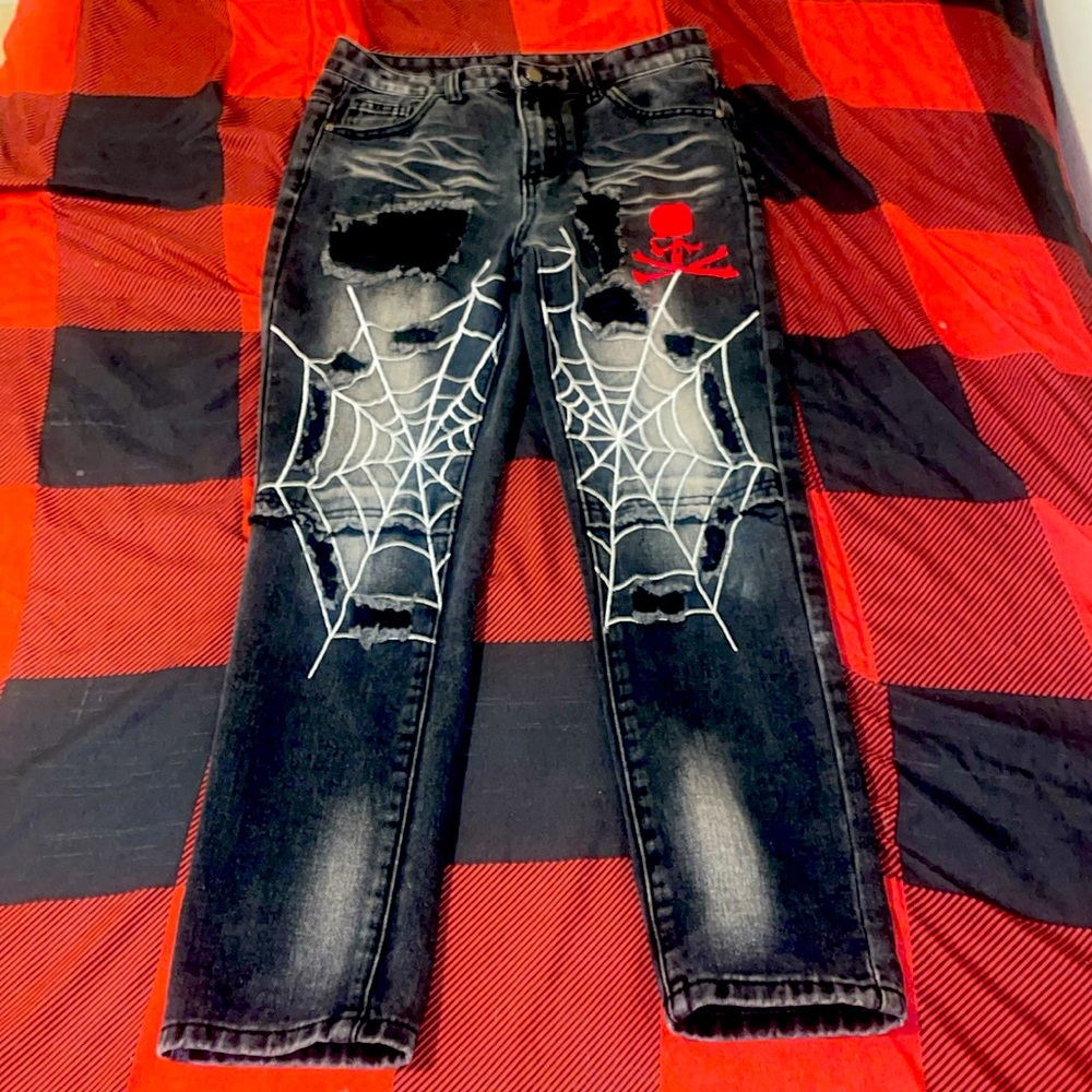 I am selling Spider-Man jeans size 13 in kids